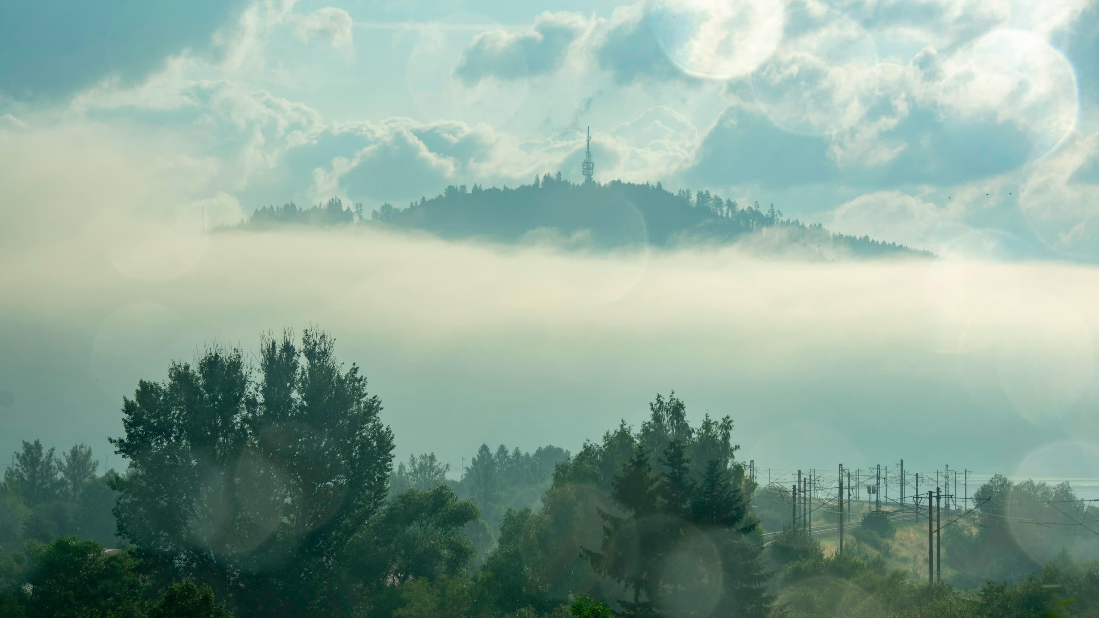 Towering above the sea of fog